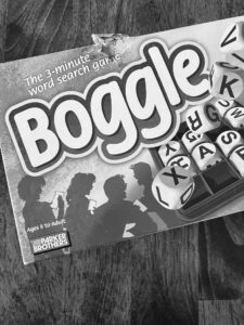 A black-and-white photo of an old, damaged Boggle box
